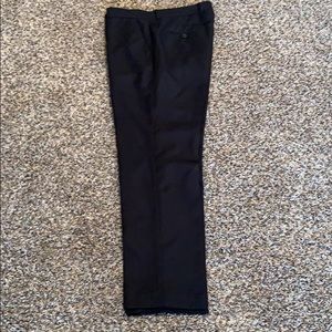 Men’s black slacks.